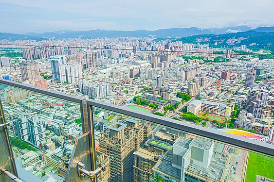 From rooftop of Far Eastern Mega Tower be southeast lookout to all the buildings rooftop or roof in New Taipei urban center.
