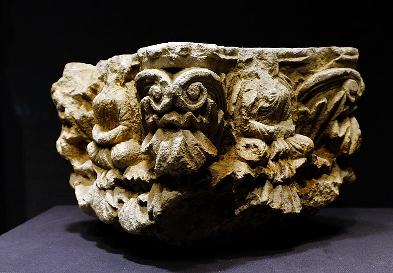 File:Pillar head, acanthus and seated Buddha.jpg