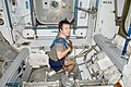 Koichi Wakata exercises using the Interim Resistive Exercise Device (IRED) equipment